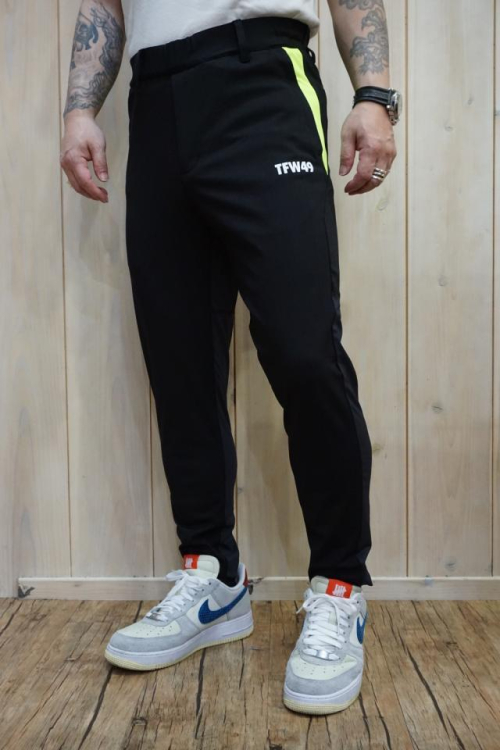 TFW49 ティーエフダブリューフォーティーナイン T072310005 STRETCH HYBRID PANTS ストレッチハイブリッドパンツ BLK × YEL 正規通販 メンズ ゴルフ